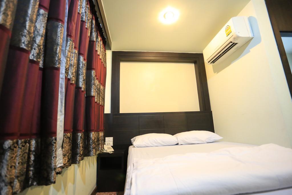Hotel Thara House Bangkok Pokoj fotografie